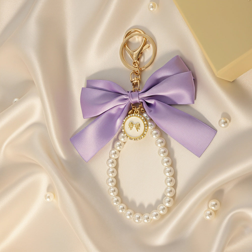 Sweet Cartoon Bow Pearl Zinc Alloy Keychain Bag Charm