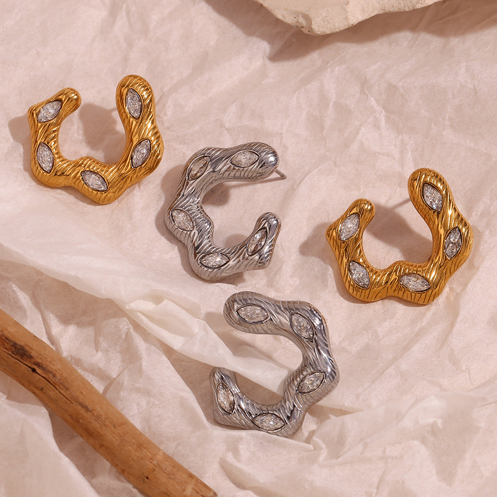 Elegantes pendientes ondulados de acero inoxidable con baño de oro de 18 quilates y circonitas marquesa para mujer