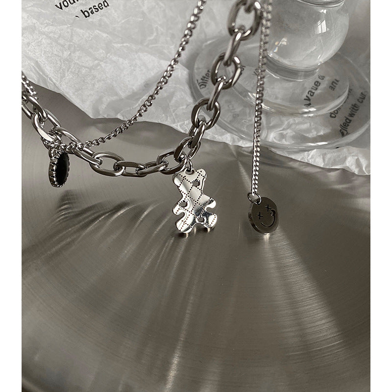 Collar minimalista de doble capa de acero titanio pulido con diseño de oso y cadena tipo cuchilla para mujer y hombre