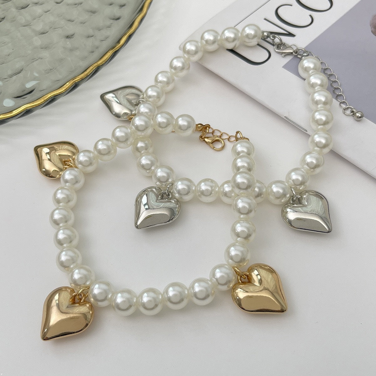 Cavigliera con fiocco a cuore in perle finte da donna