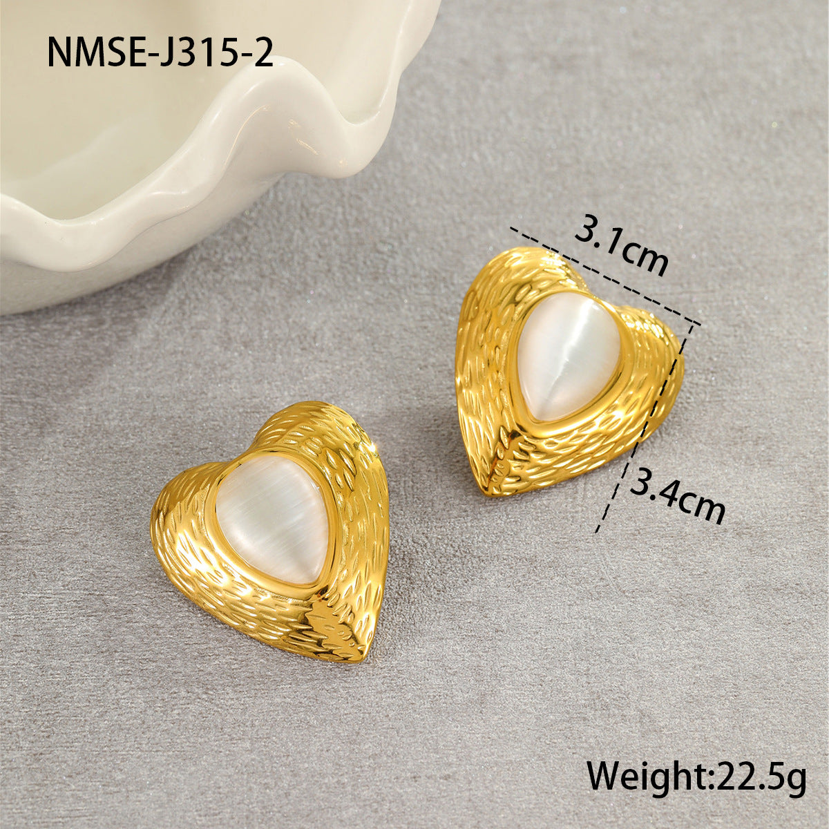 Pendientes de acero de titanio con forma de corazón de moda con incrustaciones de ojo de gato y acabado galvanizado para mujer