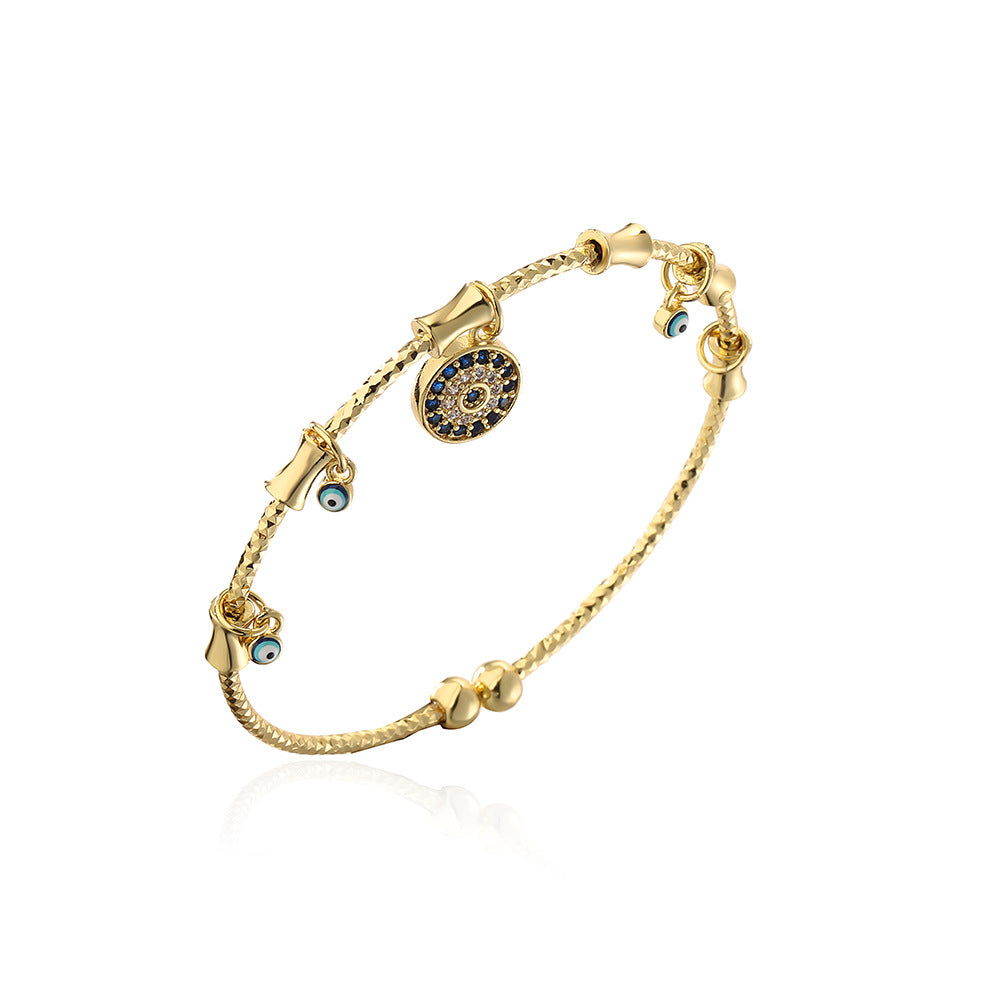 Bracciale Minimalista da Donna con Ciondolo a Mano Occhio di Allah Irregolare in Rame Placcato Oro 18K e Intarsio di Zirconi