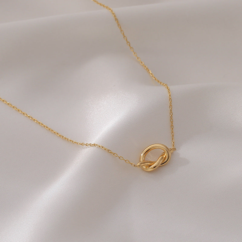 Minimalist Retro Knot Pendant Necklace for Women Titanium Steel Plated Clavicle Chain with Irregular Shape Design
