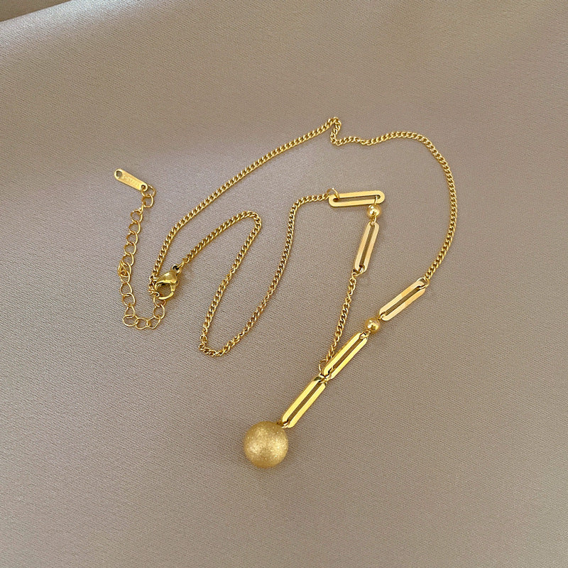 Minimalist Geometric Titanium Steel Gold-Plated Necklace with Hollow Golden Ball Pendant for Women and Men