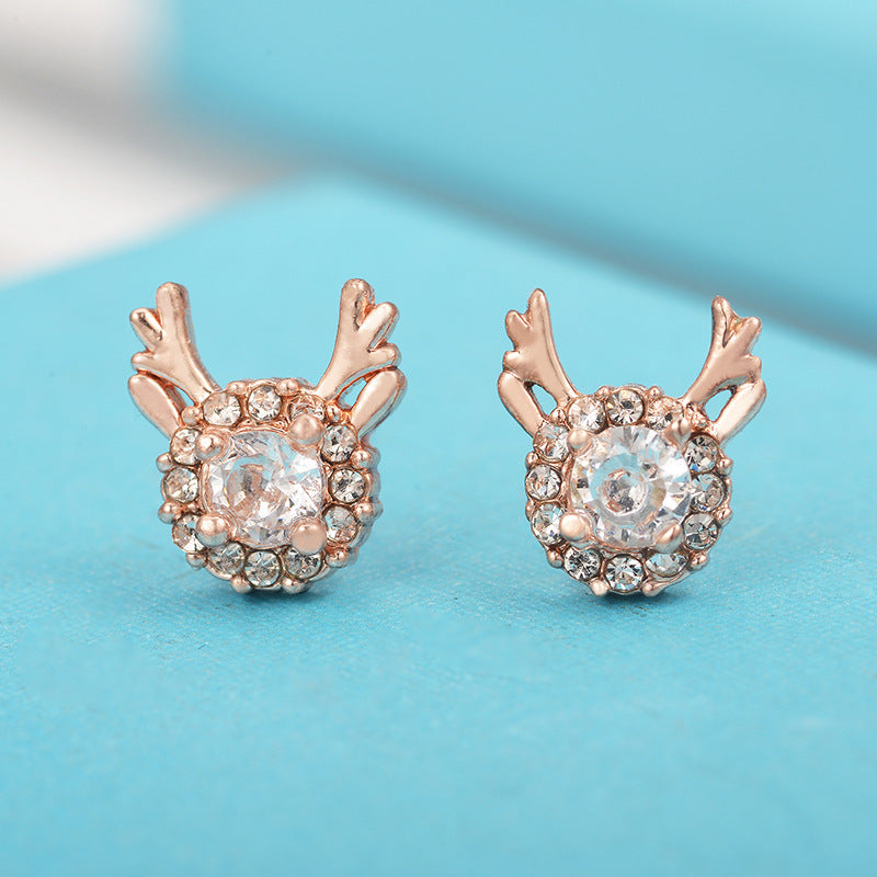 Pendientes minimalistas de astas de ciervo para mujer con acentos de copo de nieve de circonita en cobre chapado y postes de acero inoxidable