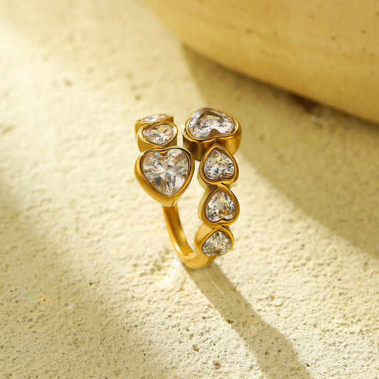 Anillo de acero de titanio con incrustaciones de circonita y acabado chapado, con forma de corazón, estilo de lujo para mujer