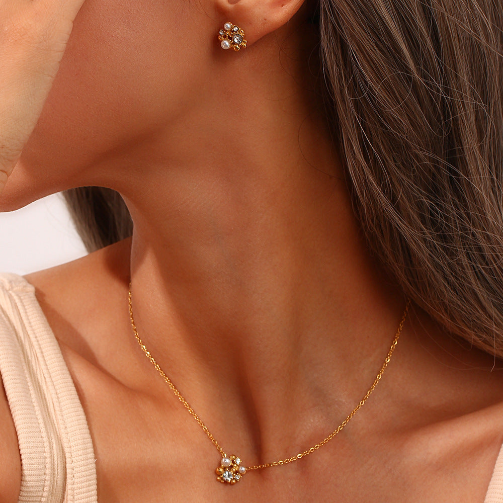 Minimalist Irregular Floral Pendant Necklace with Rhinestone and Pearl Accents on Stainless Steel Chain with 18K Gold Plating