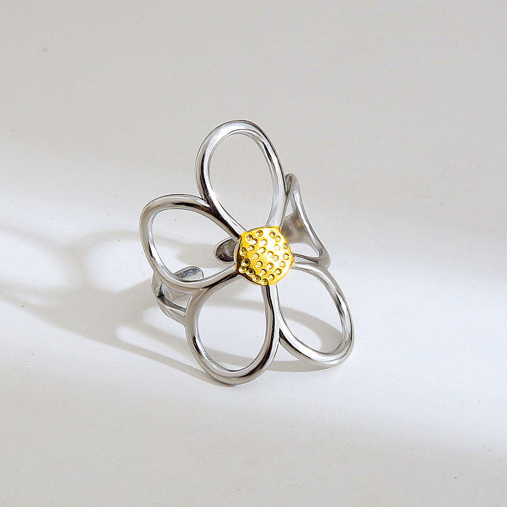 Anillo de acero de titanio abierto con diseño floral dulce y atrevido y pendientes de acero inoxidable con acabado chapado