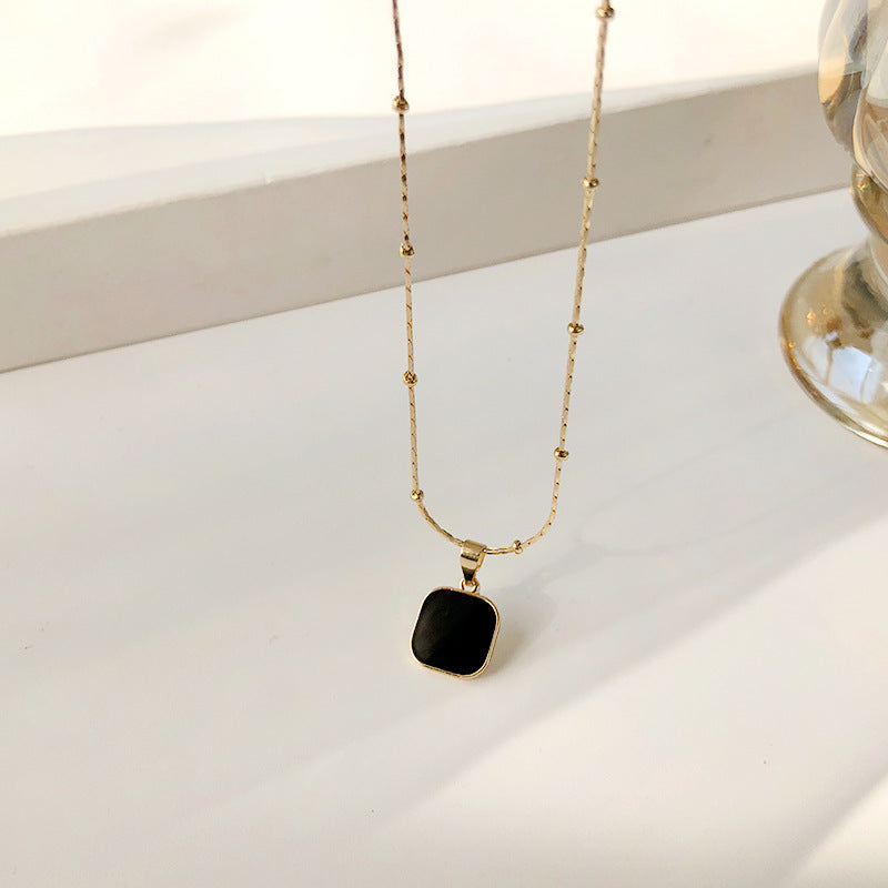 Minimalist Geometric Pendant Necklace for Women in Titanium Steel with Real Gold Plating, Wavy Chain Design for Clavicle Styling
