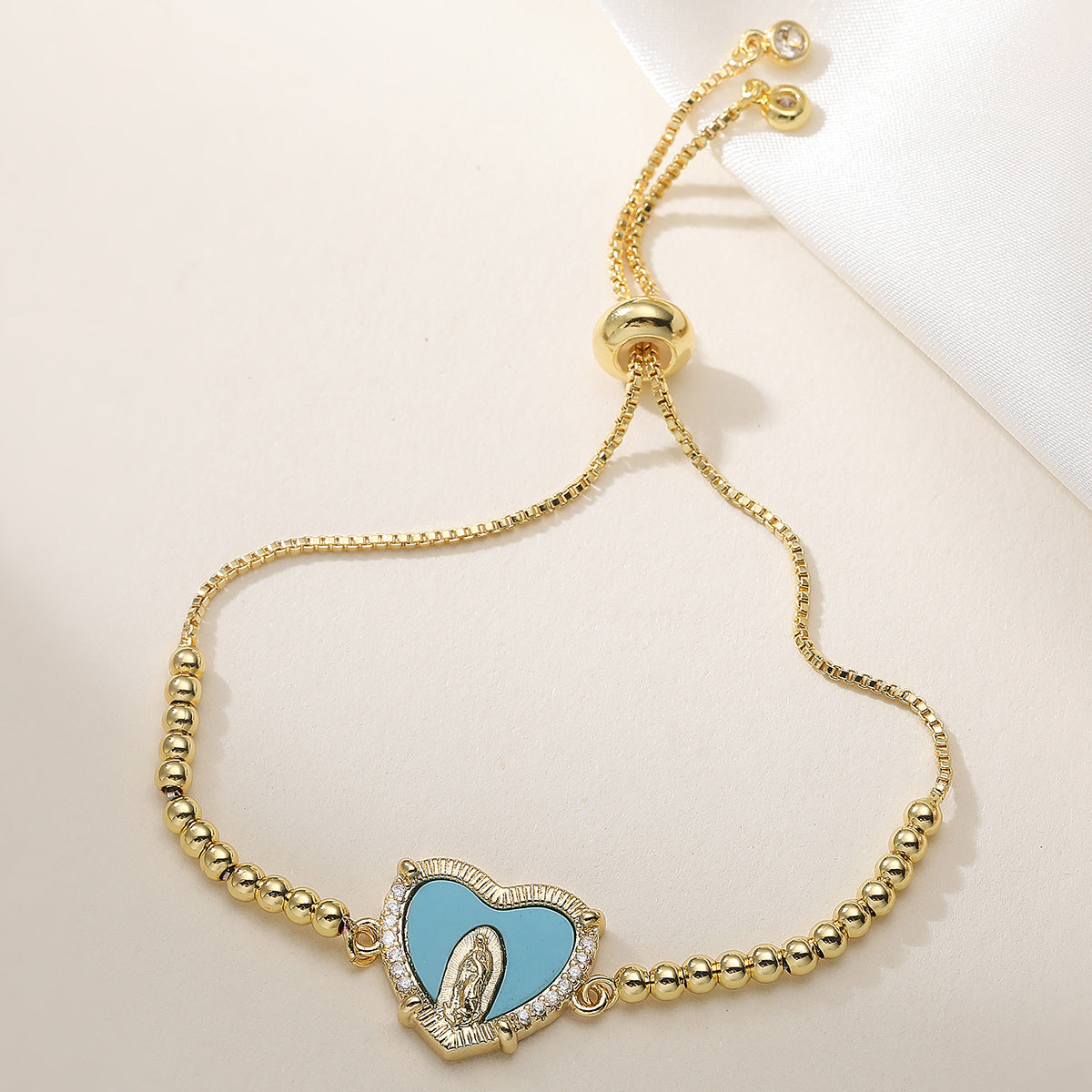 Gold Plated Brass Heart Bracelet with Cubic Zirconia and Virgin Mary Charm for Women