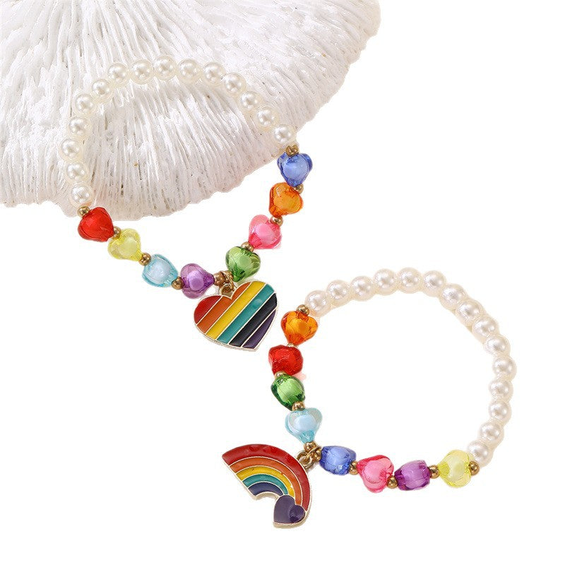 Bracciale per Bambine con Ciondolo a Cuore Floreale e Arcobaleno in Resina Plastica con Perline e Stella