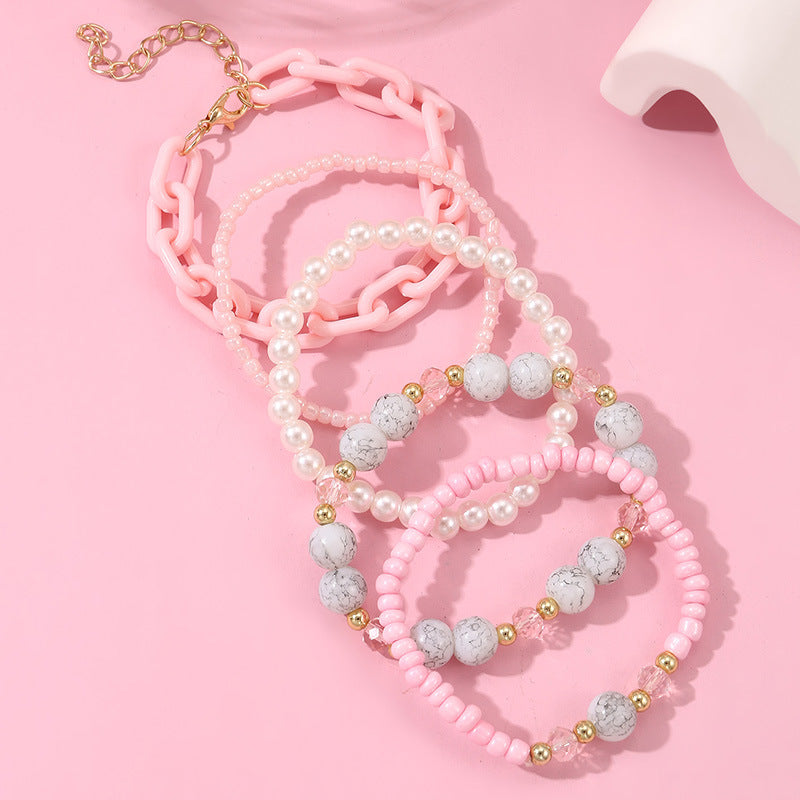Bracciale per bambini Sweet Style con perline acriliche a forma geometrica, colore rosa, perle artificiali e intarsi in cristallo