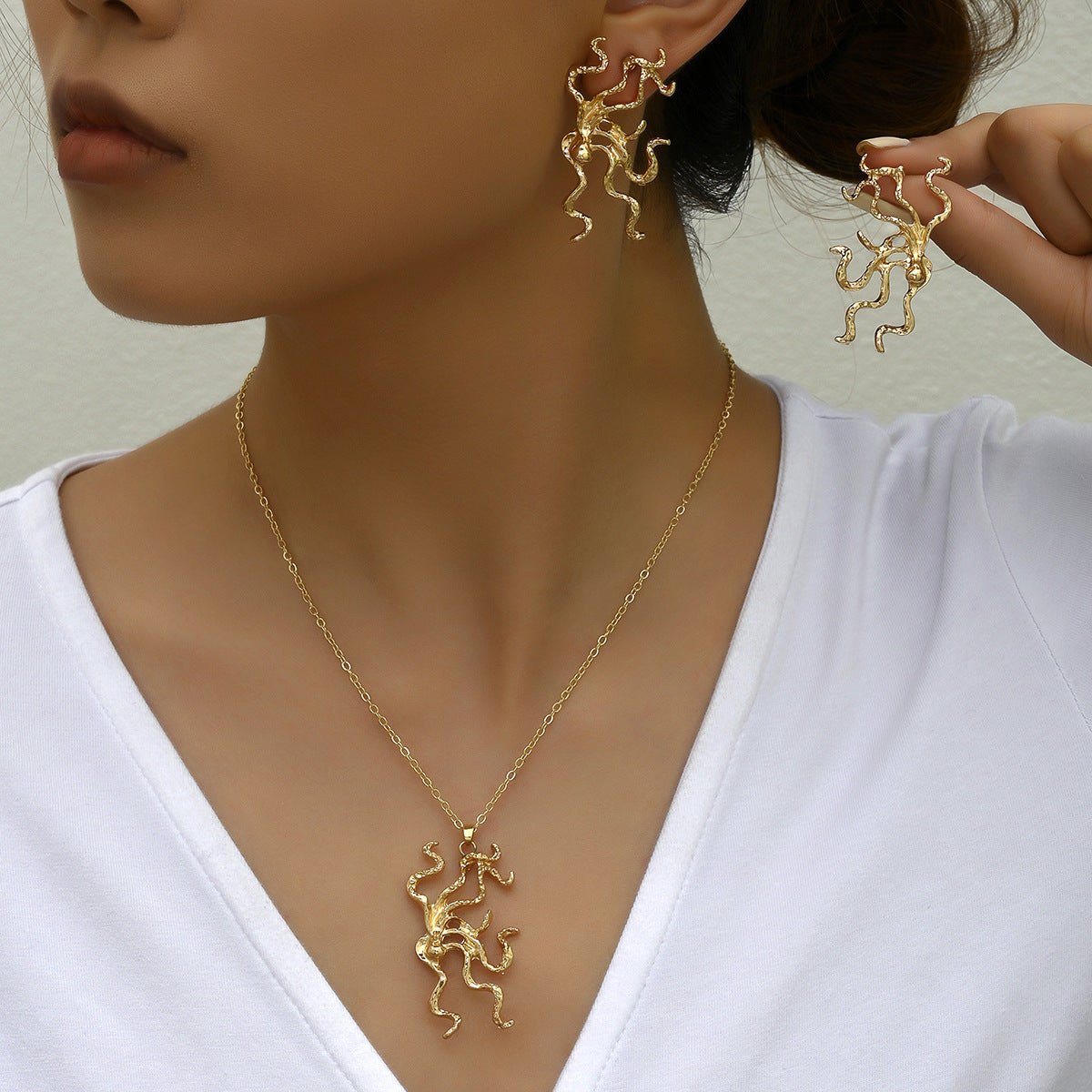 Set collana e orecchini da donna placcati in rame con design irregolare corallo e alga, stile da ufficio alla moda