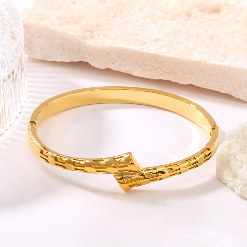 Asymmetrical Geometric Texture Stainless Steel Bracelet with 18K Gold Plating