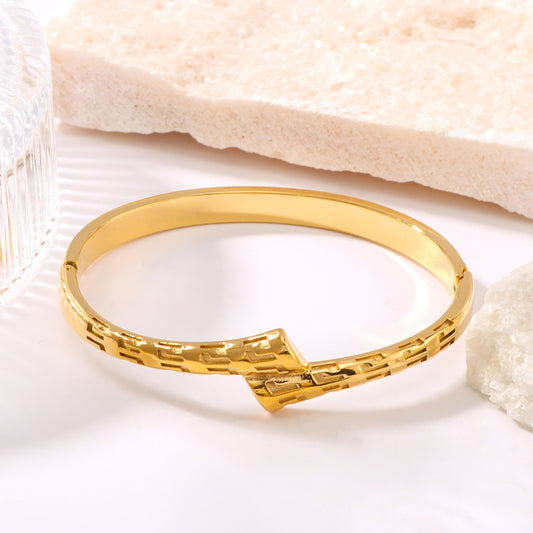 Asymmetrical Geometric Texture Stainless Steel Bracelet with 18K Gold Plating