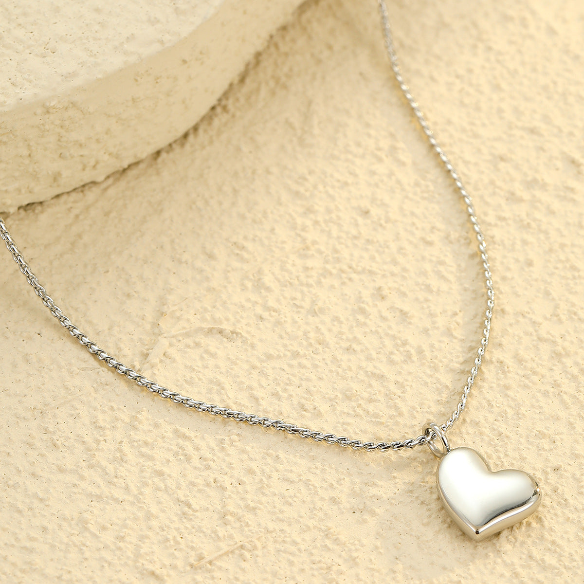 Collana per coppia alla moda a forma di cuore elettroplaccata in oro 18 carati in acciaio inossidabile