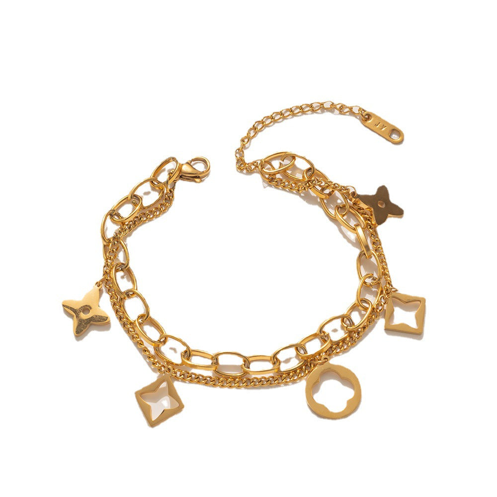 Bracciale da donna in acciaio inossidabile a forma di trifoglio, placcato in oro rosa 18 carati e con design traforato
