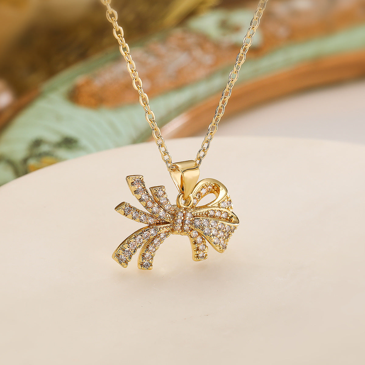 Minimalist Bow-Shaped Copper Pendant Necklace for Women with Zircon Accents, Delicate Clavicle Chain