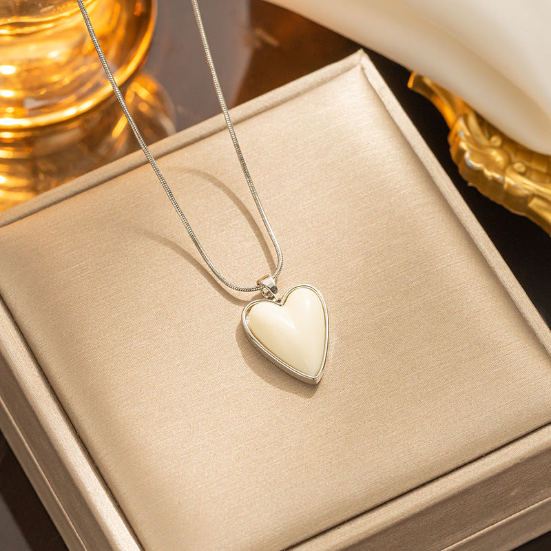 Collar con colgante minimalista de nudo de lazo de acero de titanio para mujer con cadena de serpiente chapada