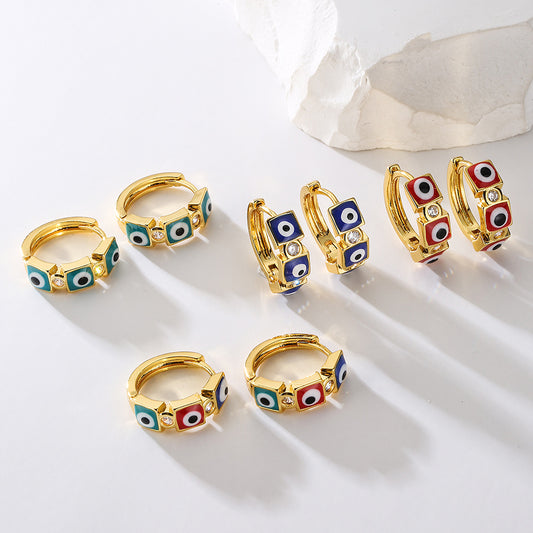 Pendientes de aro geométricos de cobre de estilo vintage con baño de oro de 18 quilates y detalle de ojo esmaltado para mujer