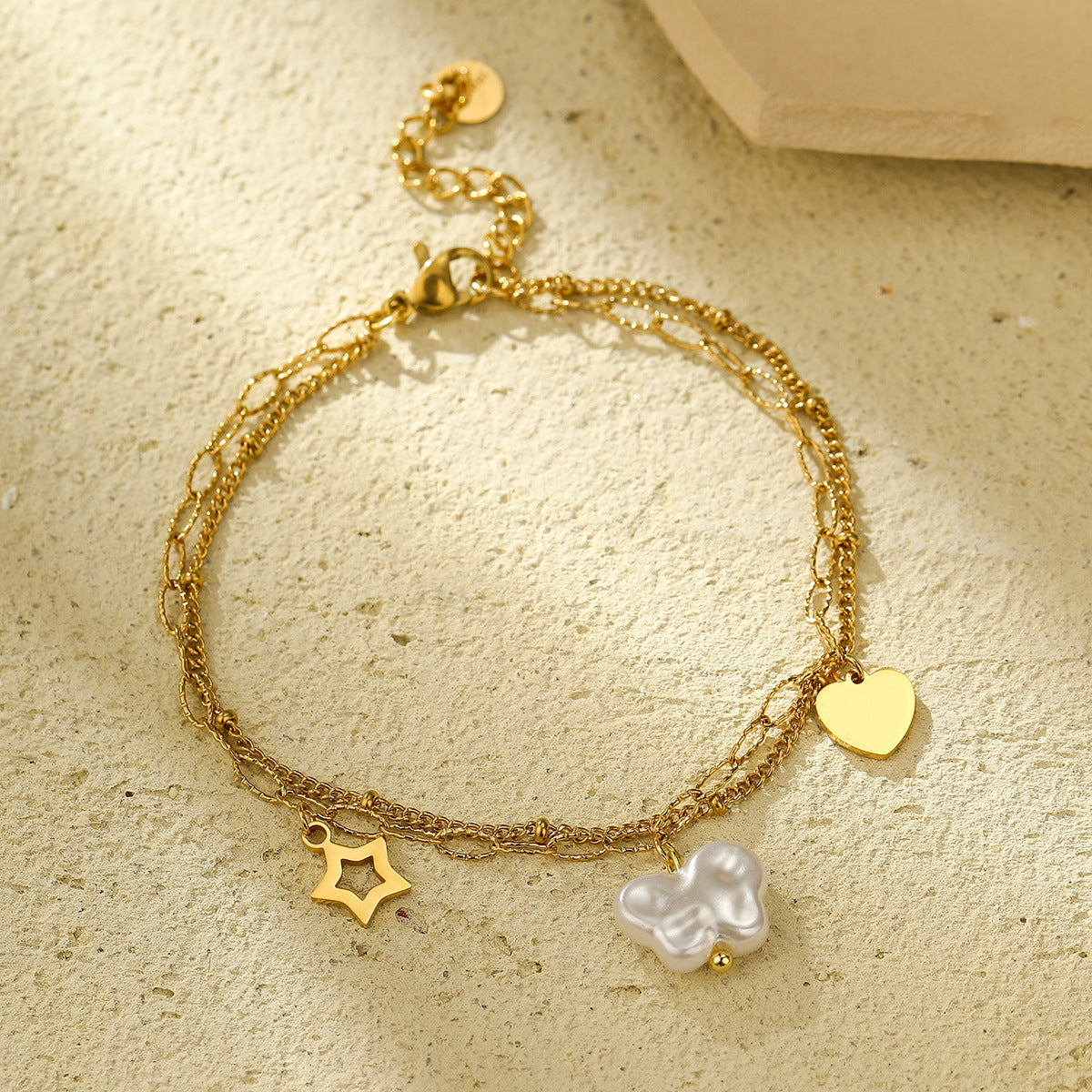 Pulsera de girasol y corazón de moda para mujer con acero inoxidable bañado en oro de 18K y cuentas de perlas