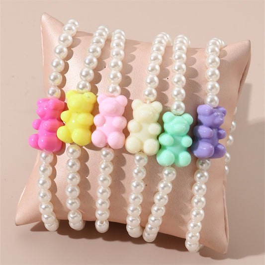 Braccialetto per bambini con ciondolo a orsetto in resina minimalista, design con perline fatte a mano e estetica fresca