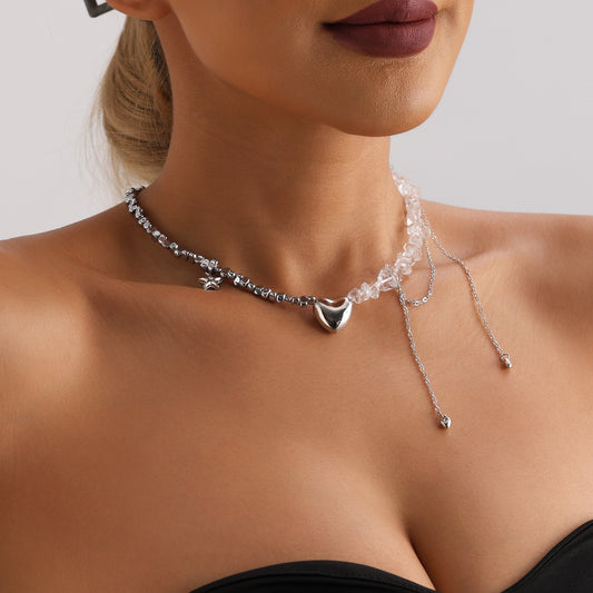 Collar minimalista con colgante de aleación en forma de corazón con detalles de estrella y borla, incrustación de obsidiana negra, cadena chapada en oro para mujer.
