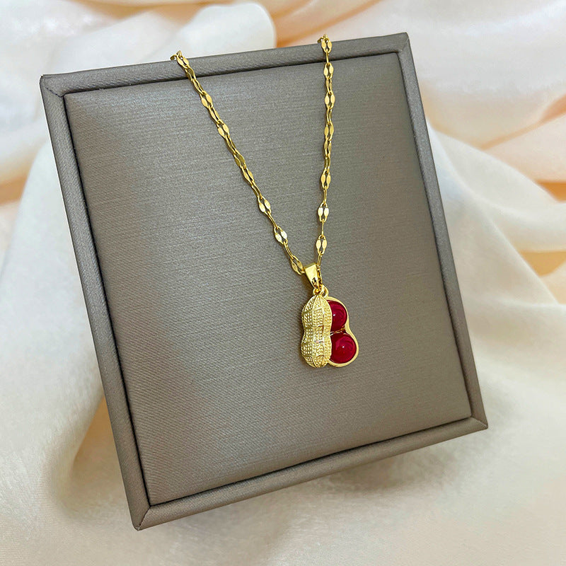 Collana con ciondolo a goccia in rame placcato oro 18 carati con micro-pavé e catena a onda in acciaio al titanio, design originale