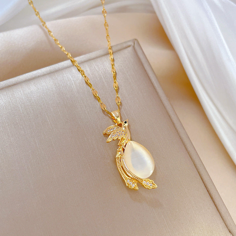 Collana con pendente Fenice a occhio di gatto geometrico minimalista da donna con catena in acciaio al titanio e intarsio di strass
