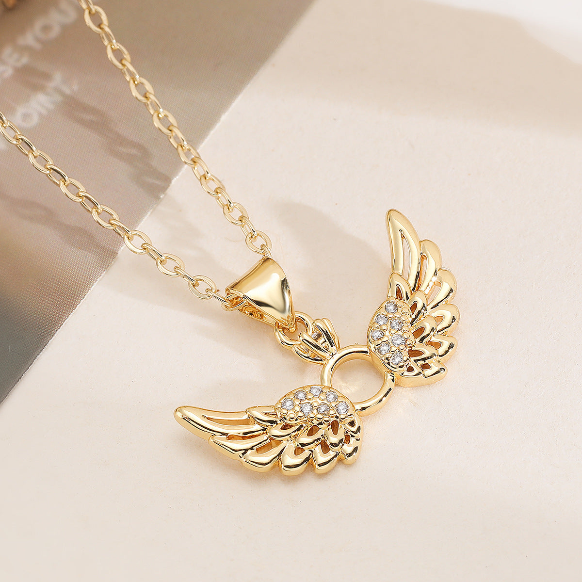 Minimalist 18K Gold Plated Brass Heart Wing Pendant Necklace with Cubic Zirconia for Women