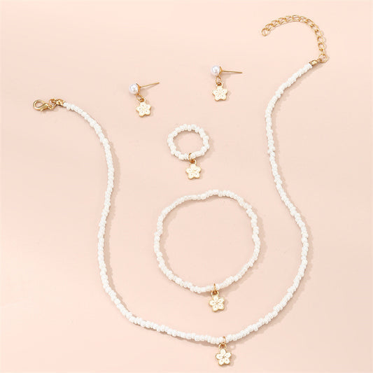 Lindo Set de Collar Minimalista Floral con Cuentas de Cristal, Pulsera, Anillo y Pendientes a juego para Niñas