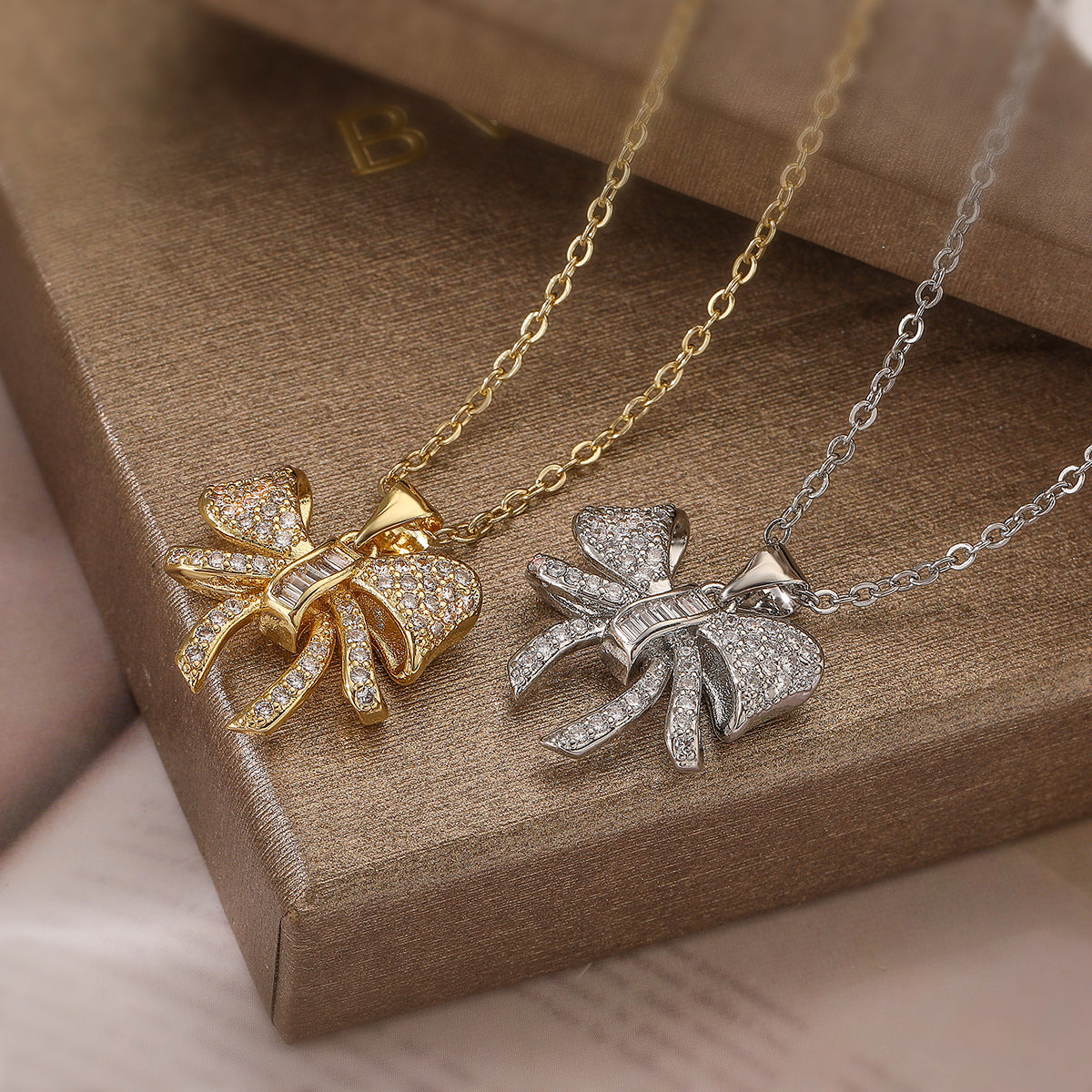 Minimalist Bowknot Pendant Necklace for Women with Copper Base Plated in Real Gold and Zirconia Accents