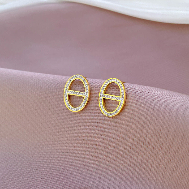 Pendientes de tuerca minimalistas geométricos de acero titanio con incrustaciones de diamantes de imitación para mujer, joyería de oreja de moda en tonos fríos para fiestas