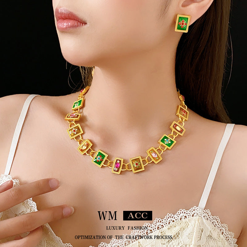 Juego de collar con colgante de mariposa y lazo floral vintage con acabado esmaltado en aleación para mujer Incluye pendientes, pulsera y cadena para clavícula