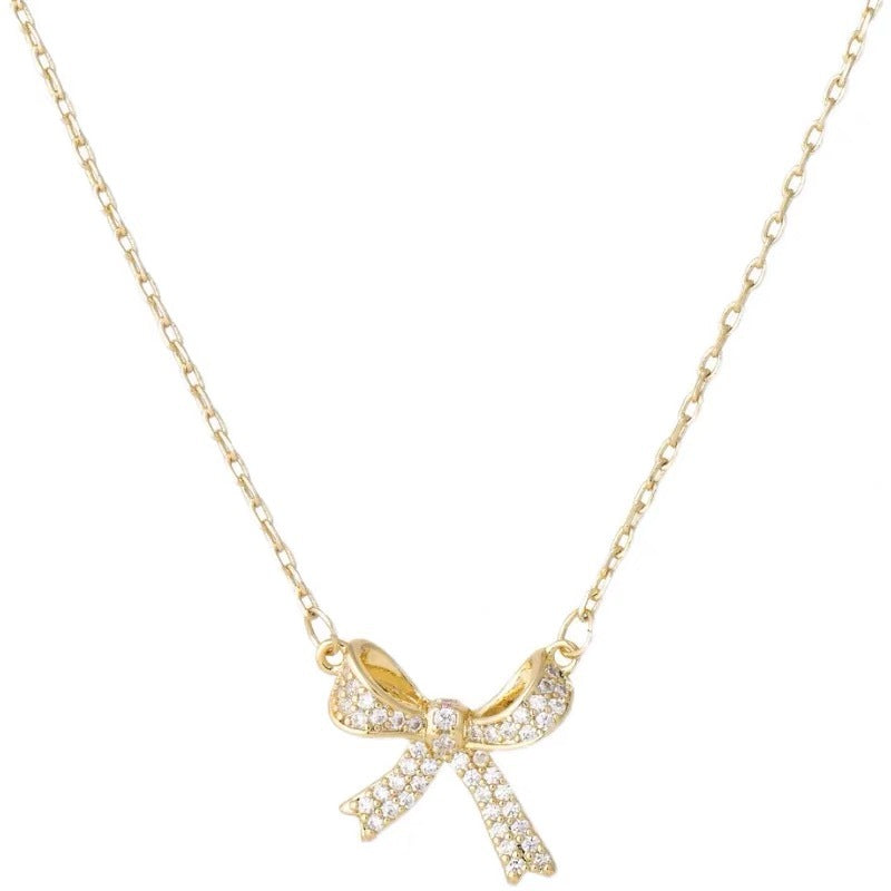 Elegante collar con colgante de lazo para mujer en acero de titanio con acabado chapado, cadena con medallón de diseño geométrico minimalista