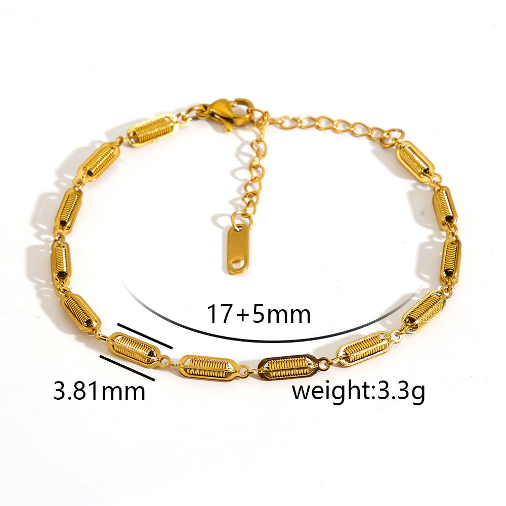 Cavigliera minimalista da donna in acciaio inossidabile placcato oro con piccole perline e ciondolo rotante
