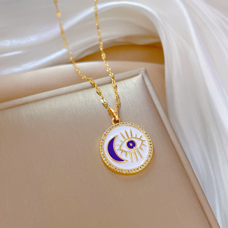 Collar minimalista de mujer con colgante de ojo redondo en acero de titanio con acabado chapado y delicada cadena de medallón
