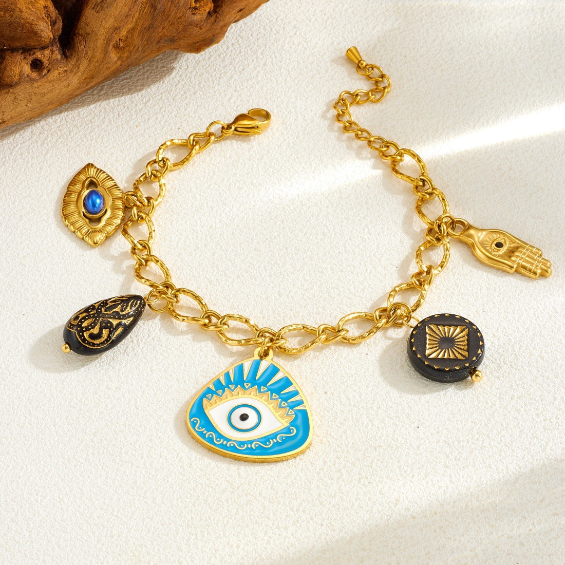 Fashion Geometric Drip Oil Plated Stainless Steel Bracelet with Irregular Blue Eye Palm Pendant for Women