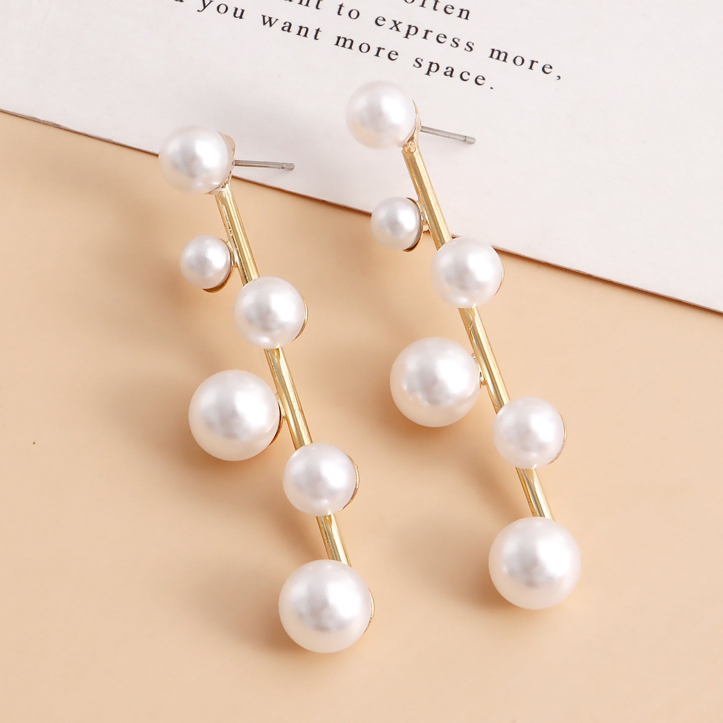 Minimalist Geometric Alloy Earrings with Plated Finish and Chain Tassel Detail