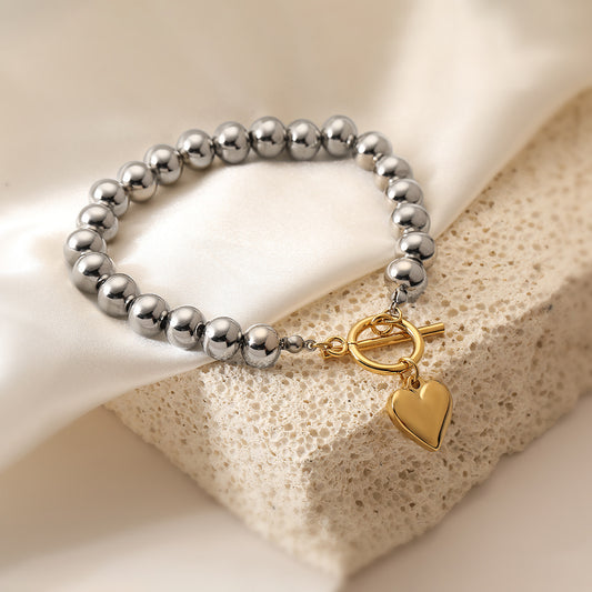 Pulsera de mujer con colgante de corazón geométrico de acero inoxidable chapado en oro de 18 quilates de moda