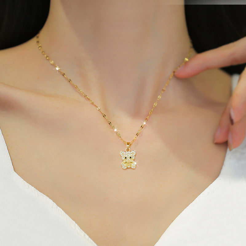 Collana con ciondolo orsetto minimalista in acciaio al titanio con intarsio di zirconi per donna e uomo