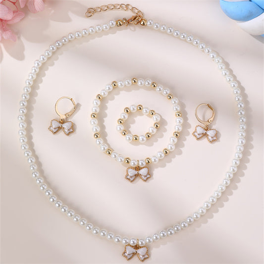 Conjunto Minimalista de Collar con Forma de Lazo de Aleación para Niñas con Detalles de Perlas, Incluye Pulsera, Anillo y Pendientes de Botón