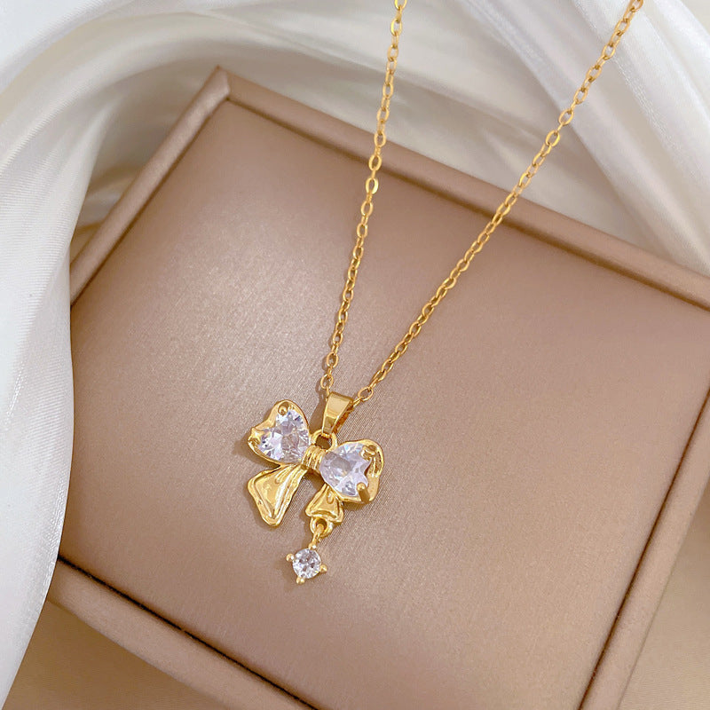 Collar de lujo de acero de titanio con colgante de mariposa y lazo de diamantes de imitación para mujer con cadena ajustable de 21 a 50 cm