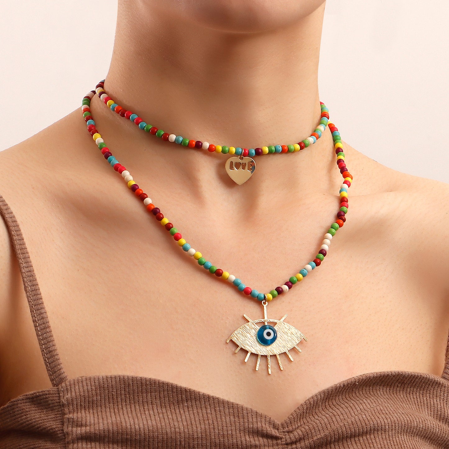 Collana con ciondolo a strati da donna in turchese geometrico con occhio di demone e catena in lega placcata