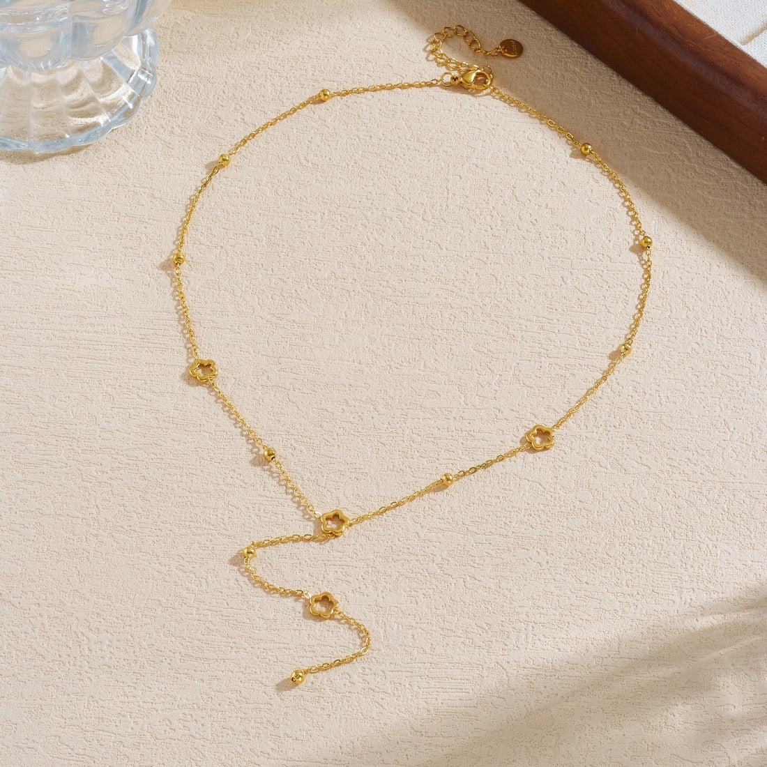 Minimalist Gold Plated Hollow Floral Stainless Steel Long Tassel Necklace for Women