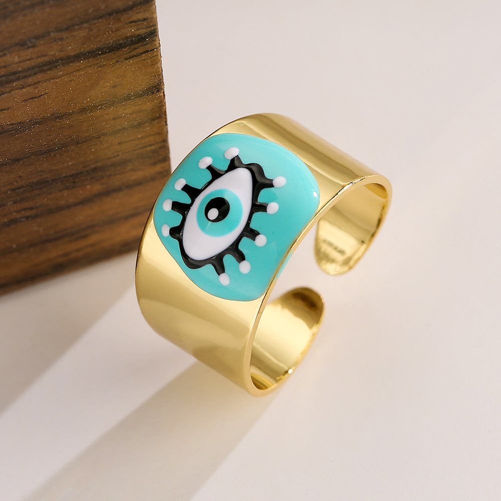 Anello Aperto Geometrico da Donna con Base in Rame Placcato Oro 18K e Smalto Design Occhio di Allah