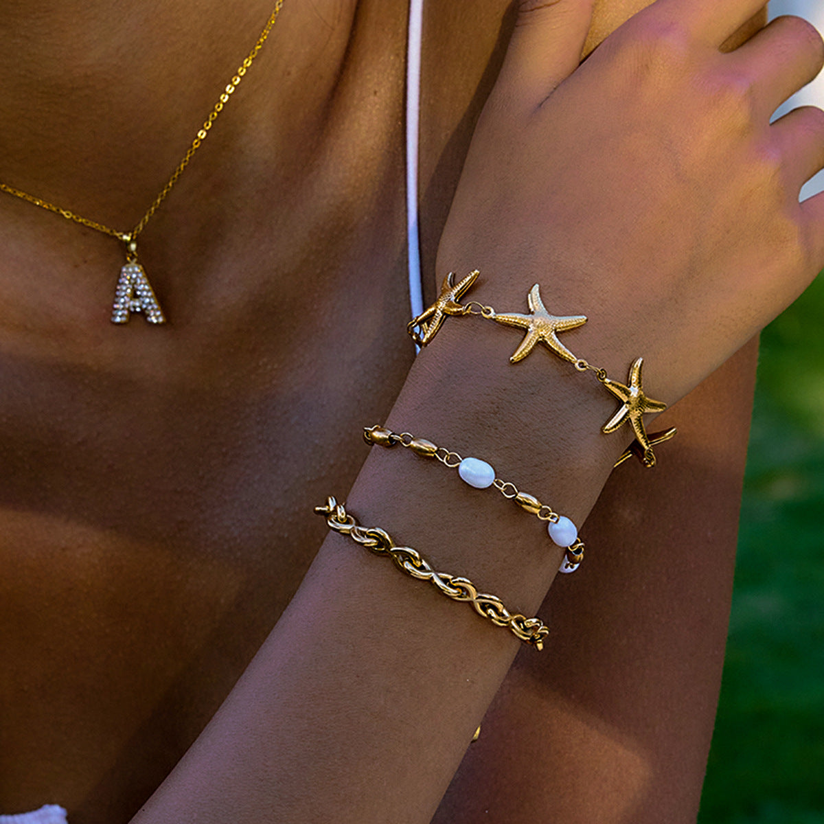 Bracciale alla moda in acciaio titanio a forma di animale con dettagli in perle d'acqua dolce per donna, gioielli in acciaio inossidabile galvanizzato