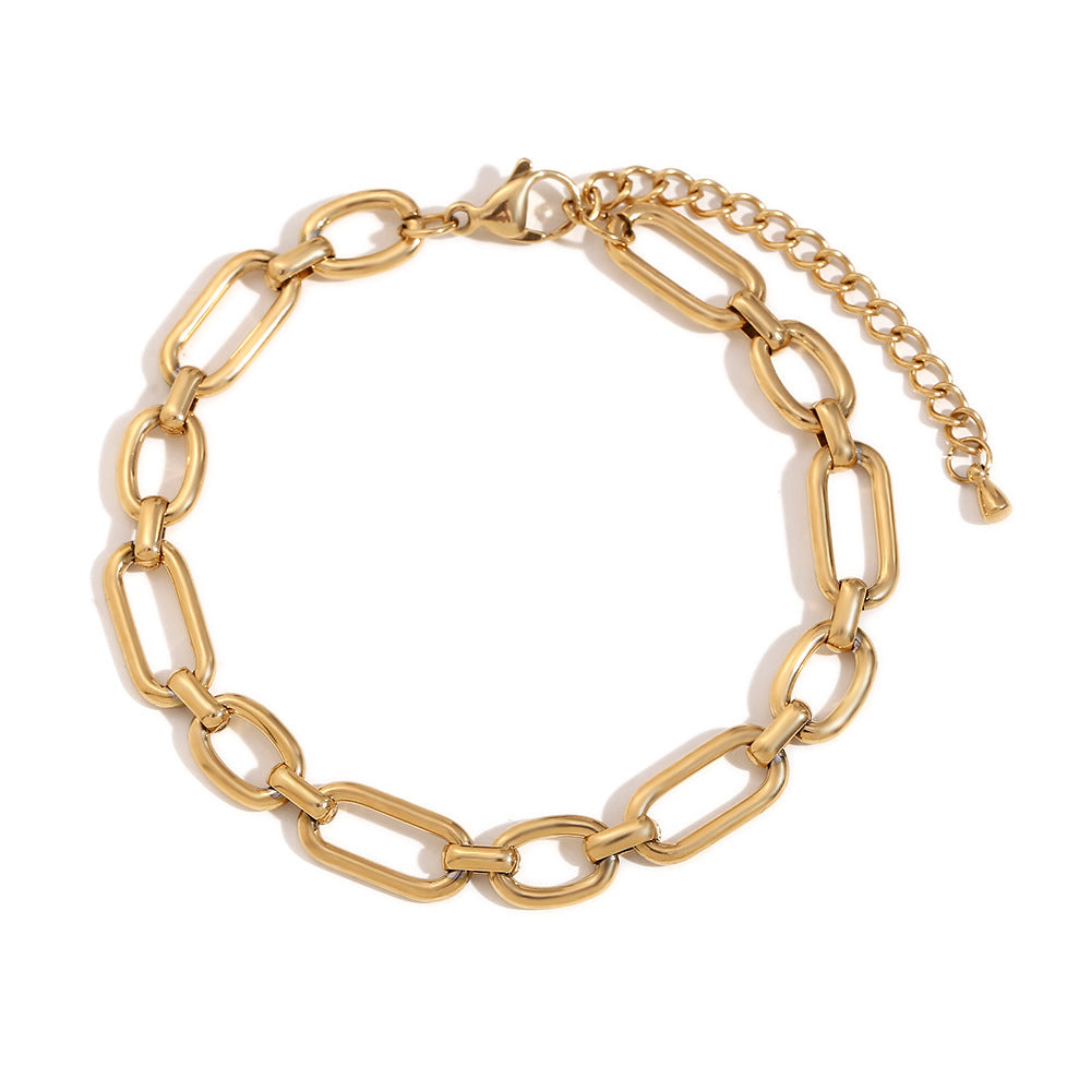 Tobillera minimalista geométrica de acero inoxidable con detalles de imperdibles chapados en oro de 14 quilates para mujer
