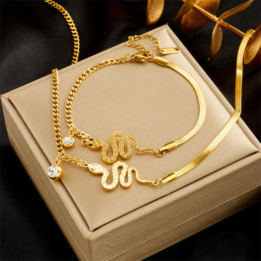 Elegante Set Minimalista di Collana e Bracciale in Acciaio al Titanio con Ciondolo Serpente Placcato Oro per Donne