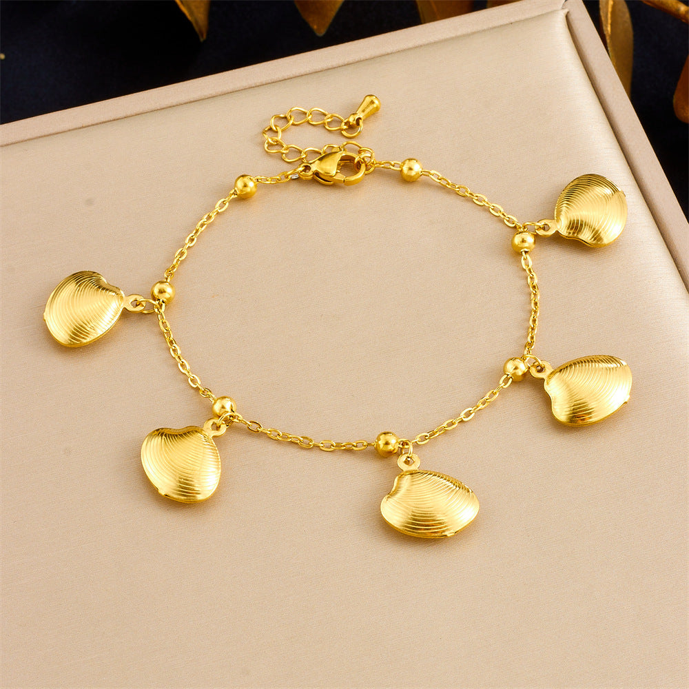 Tropical Ocean Style Gold Plated Stainless Steel Bracelet with Starfish and Tropical Fish Charms for Women